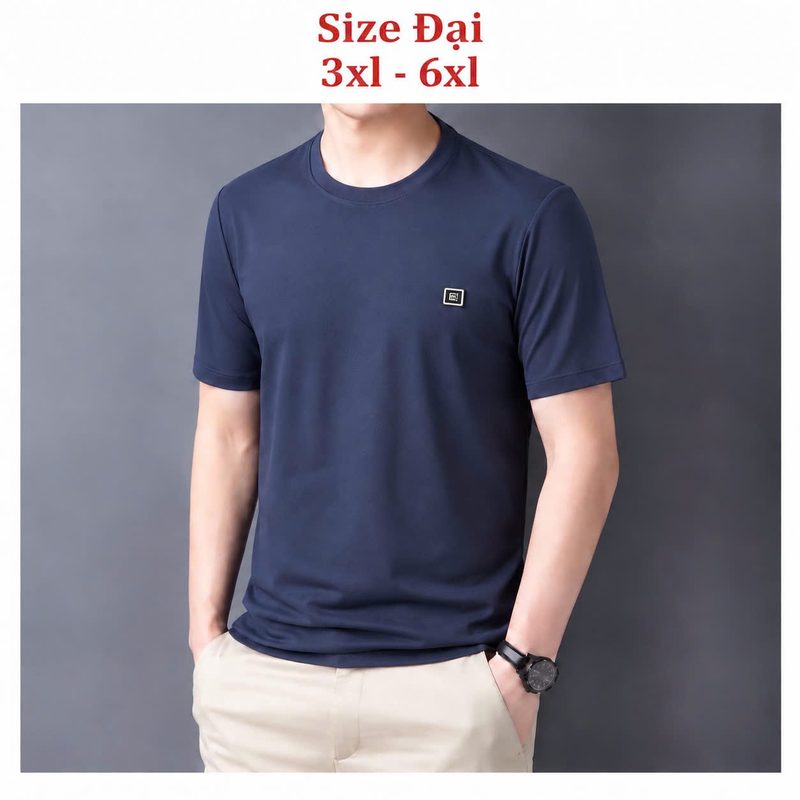 Áo cổ tròn size đại gắn tem logo vuông ngực trái – xanh than sỉ tại xưởng Hoàng Hưng